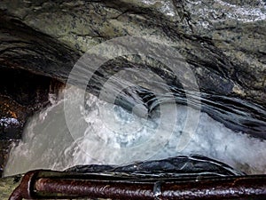 Switzerland, Lauterbrunnen, CLOSE-UP OF WAVE SPLASHING ON ROCK