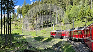 The famous Red Train Railway with Bernina Express Train going to the Alps