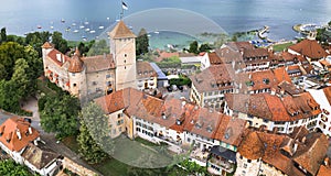Switzerland travel. Charming medieval town Murten (Morat) in scenic lake.