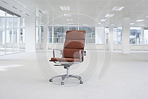 Swivel chair in empty office space