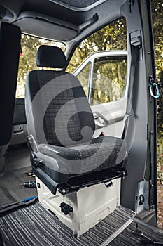 Swivel seat inside a van photo
