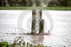 Swollen River. Flooding High Marker Gauge photo