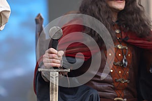 Sword and clothes of an actor impersonating Vlad Tepes (Dracula) during a performance photo