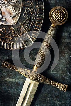 Sword detail over antique background