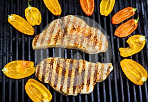 Swordfish on the grill with peppers