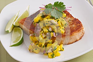 Swordfish with mango salsa photo