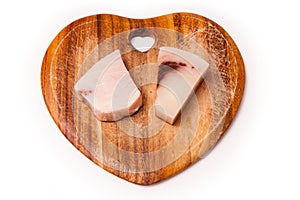 Swordfish steaks on cutting board