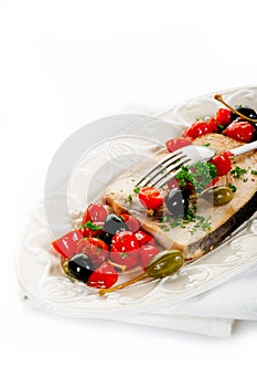 Swordfish with tomatoes capers