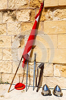 Swords, flag, helmet against