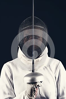 Swordsman in the fencing suit