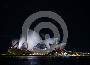 Sydney city harbour with opera house at night in australia