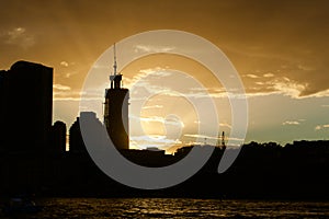 Sydney city skyline silhouette at sunset.