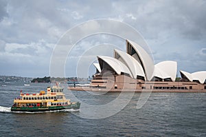 Sydney ferry in Sydney Harbour with Sydney Opera House on the background