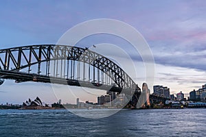 Sydney harbor bridge with Sydney CBD downtown skyline at sunset, Sydney, New South Wales, Australia