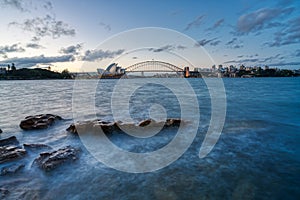 Sydney harbor skyline at night with Sydney harbor bridge, NSW, Australia