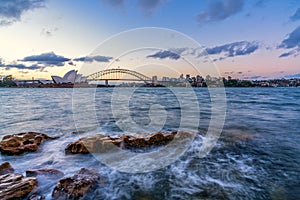 Sydney harbor skyline at sunset with Sydney harbor bridge, NSW, Australia