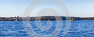 Sydney Harbour Australia on a sunny clear blue sky day with the turquoise colours of the bay