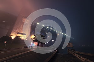 Sydney Harbour bridge covaer with fog in night time