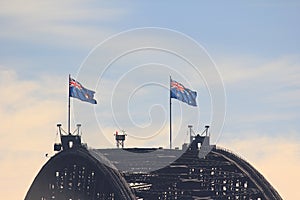 Sydney Harbour Bridge crest with flags