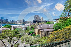 Sydney Harbour viewed from Observatory Park and overlooking Sydney Rocks area and North Sydney with colourful skies NSW Australia