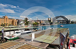 SYDNEY - OCTOBER 2015: City Harbor skyline on a sunny day. The city attracts 20 million people annually