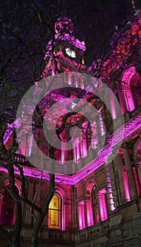 Sydney Town Hall is located in historical center and can boast colourful illumination after the sunset.