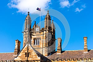 Sydney Uni building facade with Australian flag