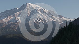 Sylvan Sentinel: Majestic Mount Rainier Framed by Forest Silhouettes