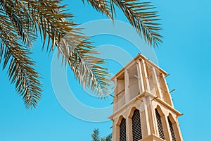 Symbol of the architecture of Dubai and the United Arab Emirates - ancient Wind towers for air conditioning and cooling of