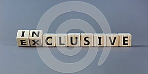 Symbol for a better inclusion. Inverted cube and changed word exclusive to inclusive. Beautiful grey background. Copy space