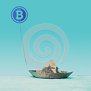 Symbol of bitcoin dragging it forward euro banknote paper boat shape. Future of Cryptocurrency optimistic concept