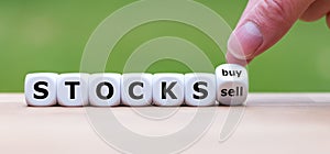 Symbol for buying or selling stocks.