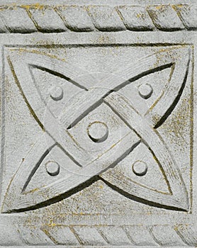 Symbol within a Celtic Tombstone cross