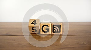 Symbol of the change from 4G to 5G. Change wooden block from 4G to 5G. Technology, network, communication concept. Beautiful white