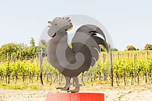 The symbol of the Chianti Classico wine along a road