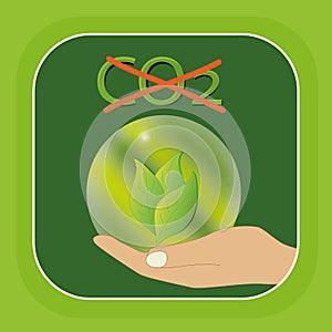 Symbol for CO2 free: hand holds a glass ball with leaves