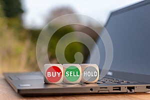 Symbol for the decision to buy, to sell or to hold.