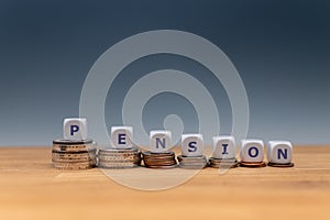 Symbol for decreasing pensions. photo