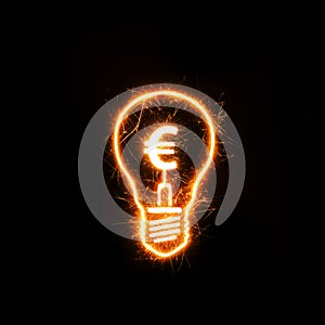 Symbol of Euro inside a sparkling bulb