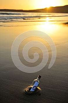 Symbol eye icon in a bottle at golden sunset