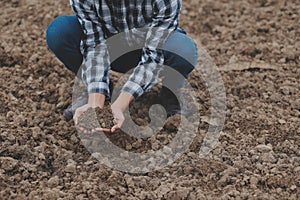 Symbol heart earth day. Handful of dirt hands heart shape. Farm organic earth. Farmer hands soil ground earth dirt garden soil