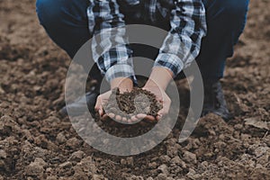 Symbol heart earth day. Handful of dirt hands heart shape. Farm organic earth. Farmer hands soil ground earth dirt garden soil