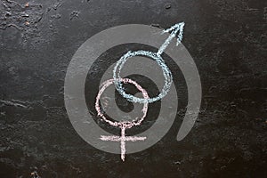 Symbol of heterosexuality on a black background photo