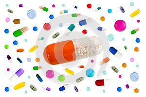 Symbol image of drugs danger : Many colorful medicines Pills and capsules with in the middle a big one on white