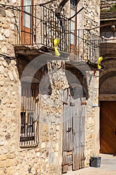 A symbol of the independence of Catalonia on the balconies of an old Spanish building