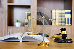 Symbol of Judge law attorney gavel with Justice lawyers table desktop, workplace with documents photo
