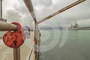 Symbol of love, heart-shaped lock chained on a pier in Novorossiysk