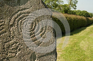 Symbol at Newgrange, Ireland photo