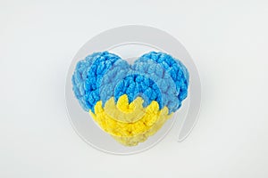 Symbol of peace and love. Flag of Ukraine in the shape of a heart isolated on a white background