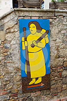 The symbol of the Via Francigena in the village of Monteriggioni. photo